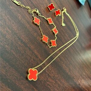 Elegant Gold and Red Clover Jewelry Set